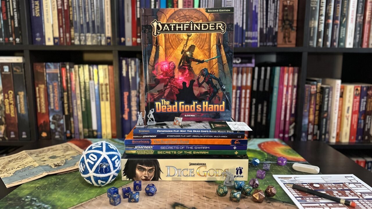 Livros, mapas, dados e miniaturas dos lançamentos de Pathfinder e Starfinder de setembro de 2026