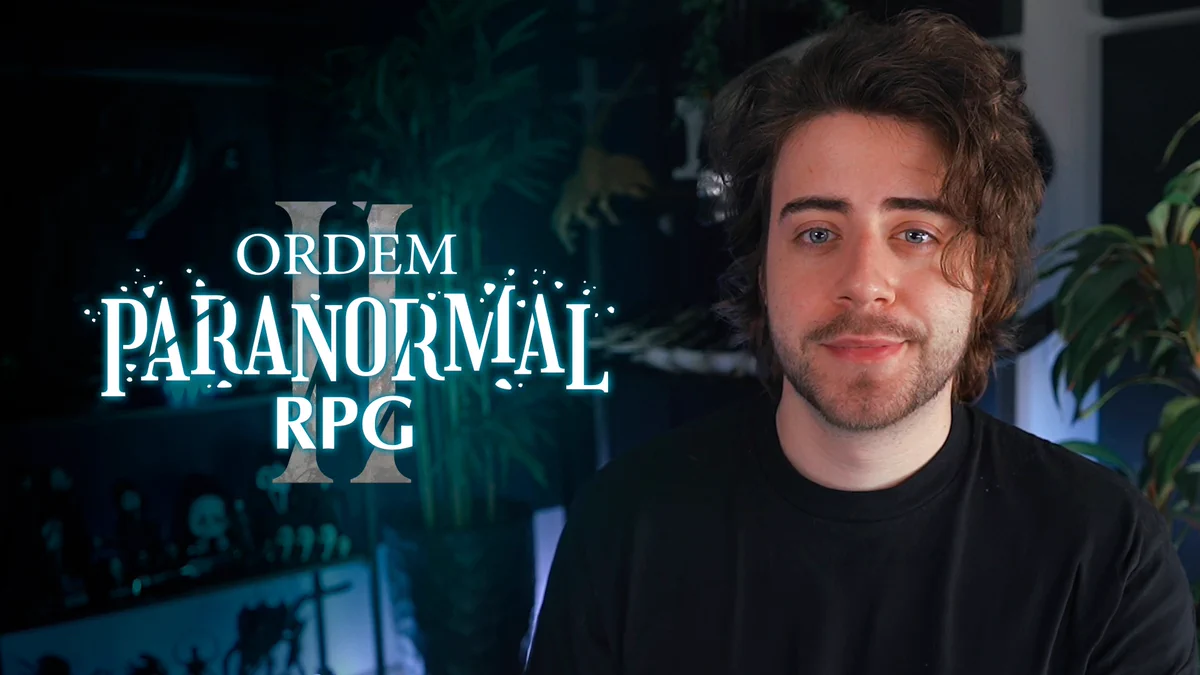 Cellbit ao lado do logotipo de Ordem Paranormal RPG 2 durante vídeo explicativo